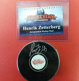 NHL Detroit Red Wings Henrik Zetterberg Autographed Puck (COA) - Hockey Cards Plus LLC
